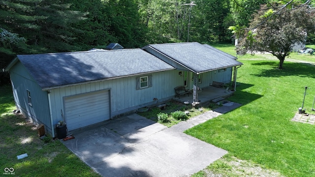 3282 S Conservation Club Rd, Morgantown, IN 46160 - view of front of home featuring a shingled roof, a porch, a front lawn, concrete driveway, and an attached garage