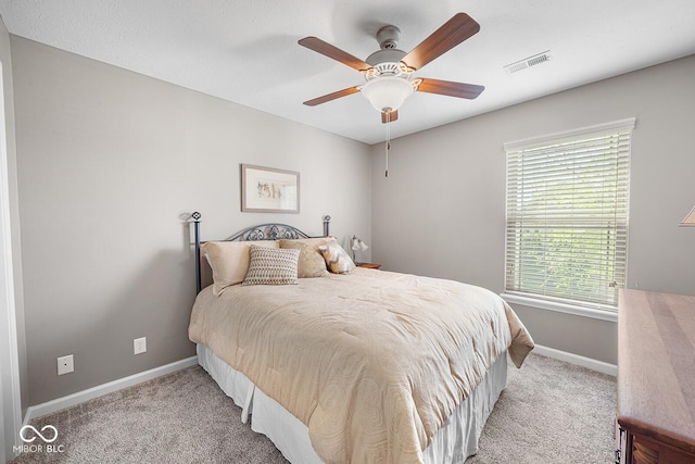 5136 Centerview Dr, Battle Ground, IN 47920 - bedroom featuring baseboards, ceiling fan, carpet flooring, and visible vents