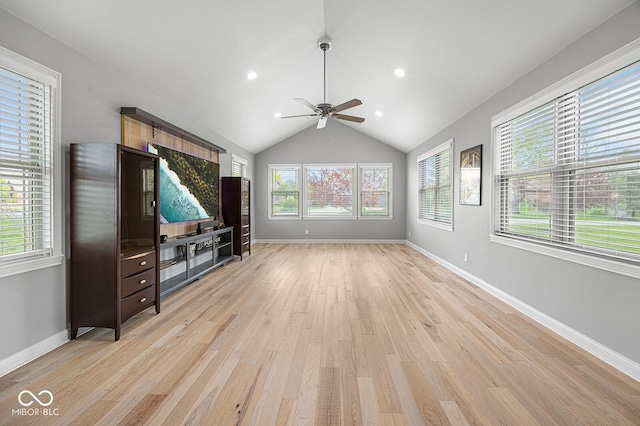 5136 Centerview Dr, Battle Ground, IN 47920 - unfurnished living room featuring a ceiling fan, baseboards, vaulted ceiling, and light wood finished floors