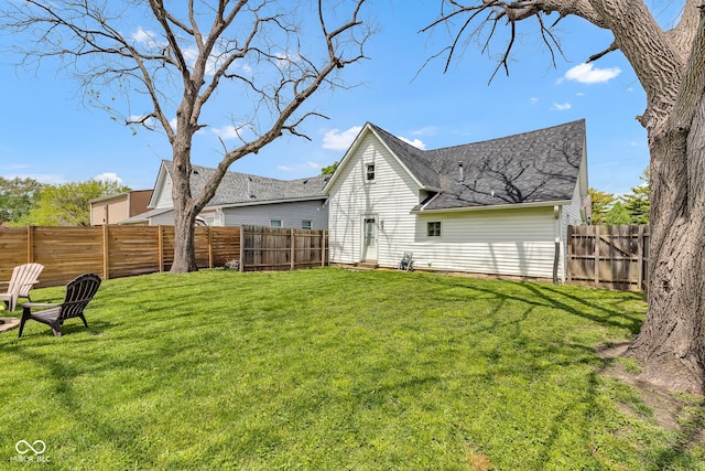 view of yard featuring a fenced backyard