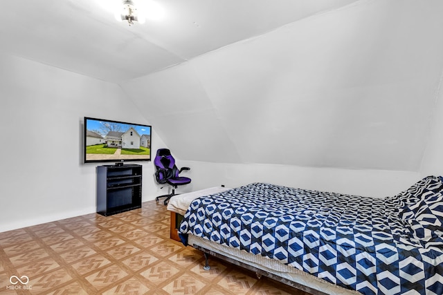 bedroom with vaulted ceiling