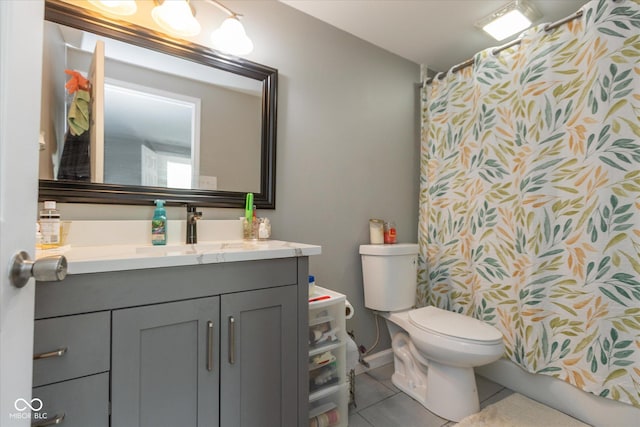 bathroom with toilet, a shower with shower curtain, tile patterned flooring, and vanity
