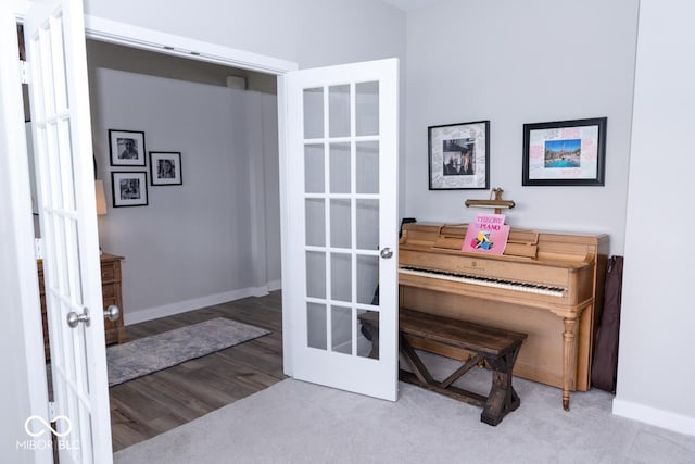 9176 Springbrook Dr, Pendleton, IN 46064 - sitting room with french doors, baseboards, and wood finished floors