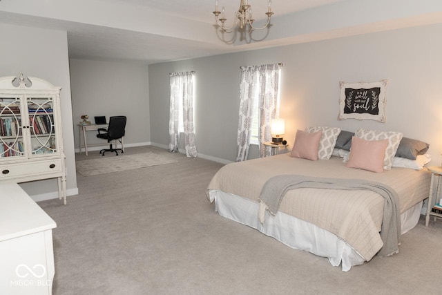 9176 Springbrook Dr, Pendleton, IN 46064 - carpeted bedroom with a chandelier, baseboards, and a desk