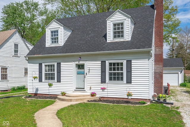 155 N Franklin Rd, Indianapolis, IN 46219 - cape cod house with a garage, a chimney, a shingled roof, and a front yard
