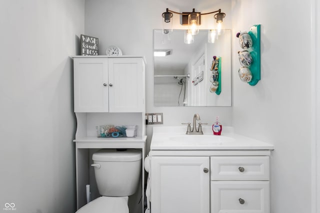 155 N Franklin Rd, Indianapolis, IN 46219 - bathroom featuring vanity, walk in shower, toilet, and visible vents