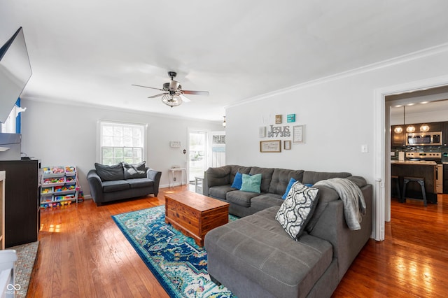 155 N Franklin Rd, Indianapolis, IN 46219 - living area with wood-type flooring, ceiling fan, and ornamental molding