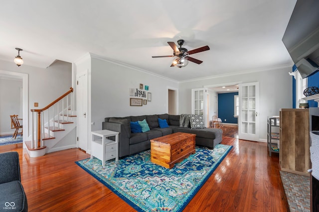 155 N Franklin Rd, Indianapolis, IN 46219 - living area with crown molding, ceiling fan, french doors, wood finished floors, and stairway