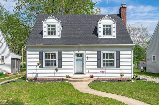 155 N Franklin Rd, Indianapolis, IN 46219 - cape cod house with a chimney, roof with shingles, and a front lawn