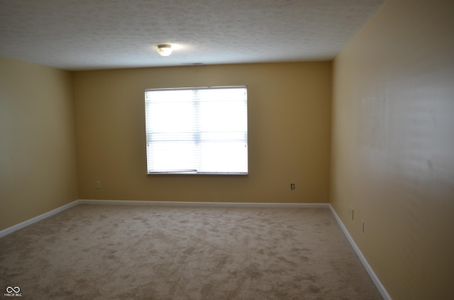 5708 Outer Bank Rd, Indianapolis, IN 46239 - empty room with light colored carpet and a textured ceiling