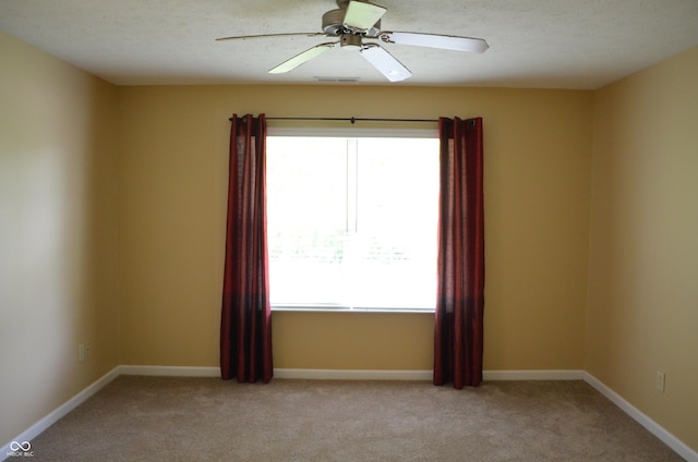 5708 Outer Bank Rd, Indianapolis, IN 46239 - empty room featuring plenty of natural light, light carpet, and ceiling fan