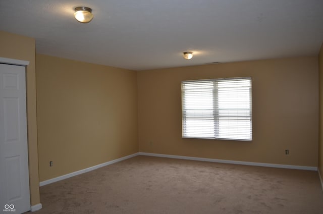5708 Outer Bank Rd, Indianapolis, IN 46239 - empty room with light carpet and baseboards