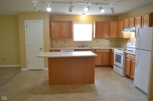 5708 Outer Bank Rd, Indianapolis, IN 46239 - kitchen featuring white appliances, under cabinet range hood, light countertops, and a kitchen island