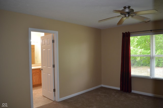5708 Outer Bank Rd, Indianapolis, IN 46239 - unfurnished room featuring a ceiling fan and light colored carpet