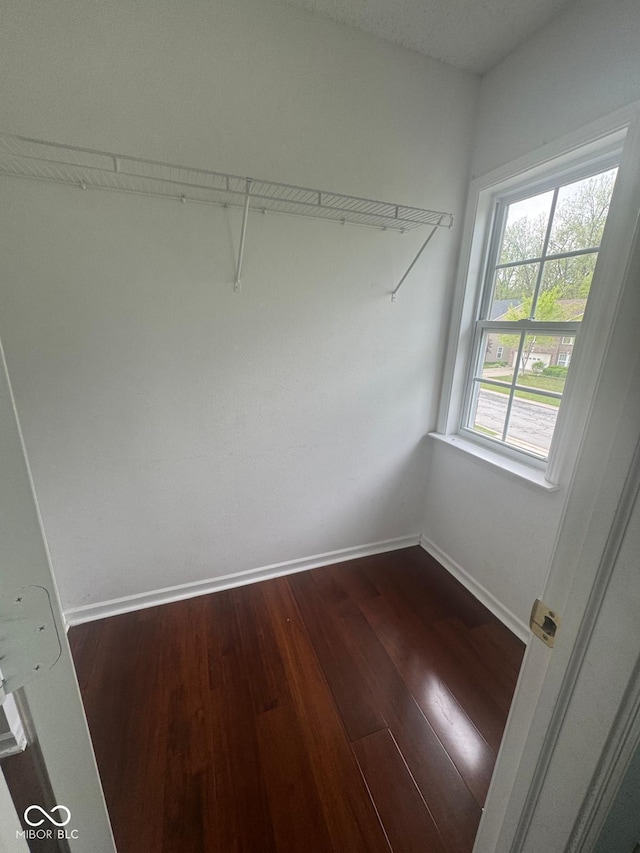 317 Legacy Blvd, Greenwood, IN 46143 - spacious closet featuring dark wood finished floors