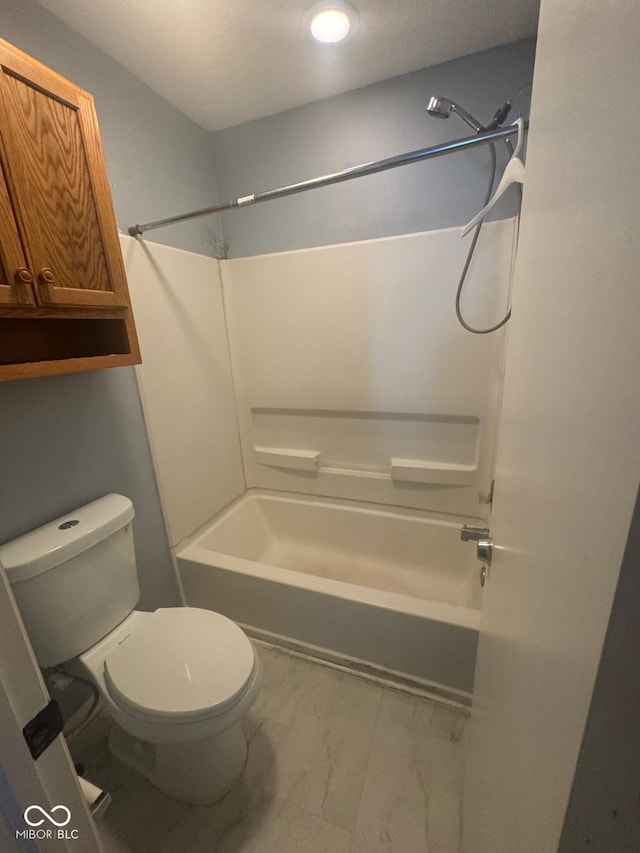 317 Legacy Blvd, Greenwood, IN 46143 - full bathroom featuring bathing tub / shower combination, toilet, and marble finish floor