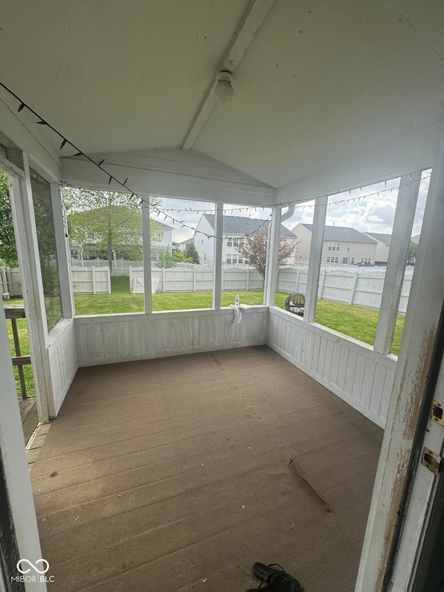 317 Legacy Blvd, Greenwood, IN 46143 - unfurnished sunroom featuring beam ceiling and a healthy amount of sunlight