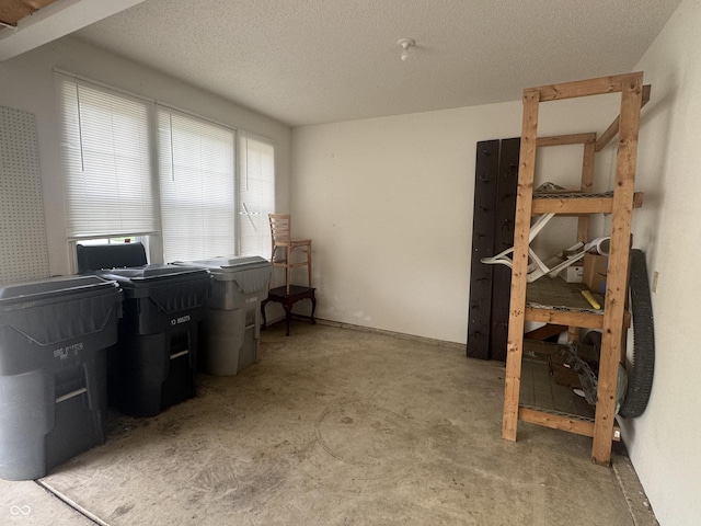 317 Legacy Blvd, Greenwood, IN 46143 - office featuring concrete floors and a textured ceiling
