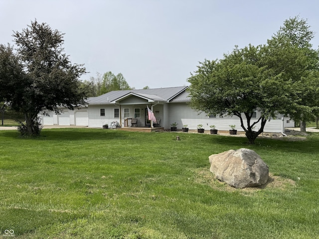 11815 E Pocahontas Dr, Greencastle, IN 46135 - single story home featuring a front lawn, a porch, and metal roof