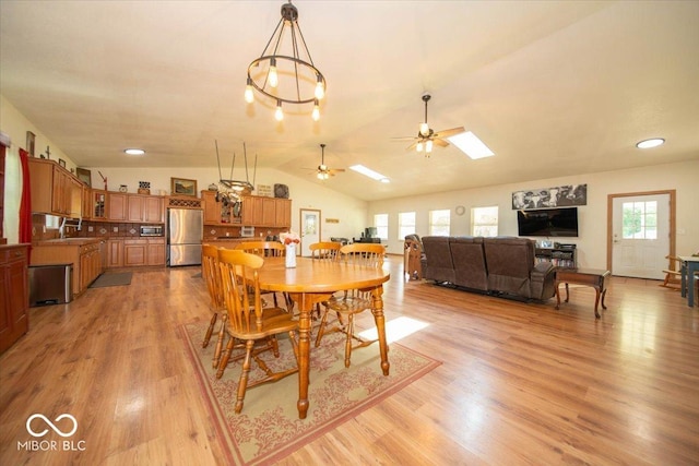11815 E Pocahontas Dr, Greencastle, IN 46135 - dining area with a ceiling fan, light wood-style floors, vaulted ceiling, and recessed lighting