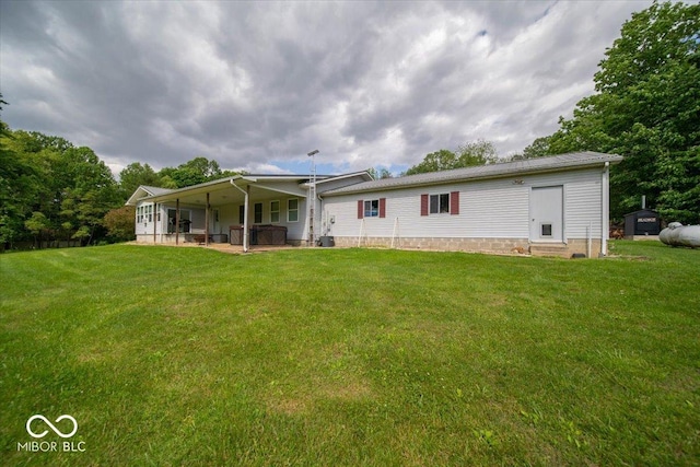 11815 E Pocahontas Dr, Greencastle, IN 46135 - back of house featuring a yard and entry steps