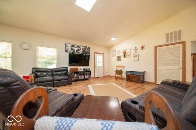 11815 E Pocahontas Dr, Greencastle, IN 46135 - living room with vaulted ceiling, wood finished floors, and recessed lighting