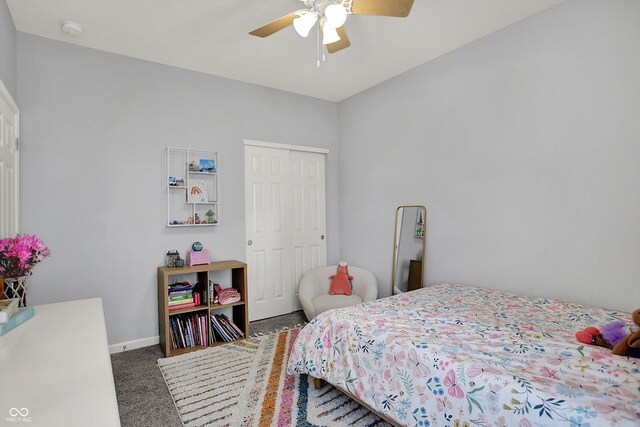 5580 Pintail Ln, Greenwood, IN 46143 - bedroom featuring carpet flooring, a closet, baseboards, and ceiling fan