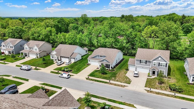 5580 Pintail Ln, Greenwood, IN 46143 - aerial perspective of suburban area with a forest