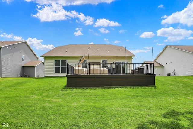 5580 Pintail Ln, Greenwood, IN 46143 - back of house with a deck, a lawn, and cooling unit