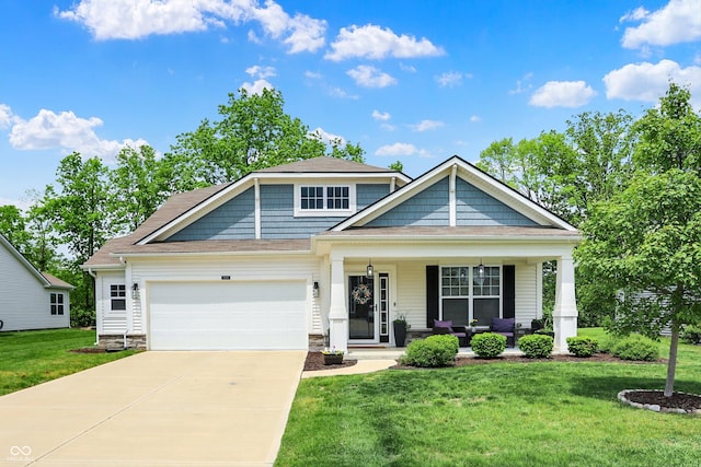 5580 Pintail Ln, Greenwood, IN 46143 - craftsman-style home featuring covered porch, a garage, driveway, and a front lawn