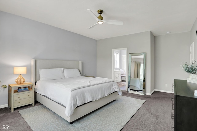 5580 Pintail Ln, Greenwood, IN 46143 - carpeted bedroom featuring baseboards, ceiling fan, and connected bathroom
