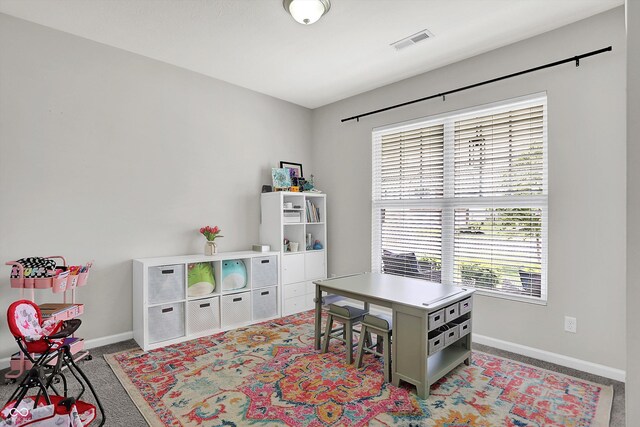 5580 Pintail Ln, Greenwood, IN 46143 - home office featuring baseboards and light colored carpet