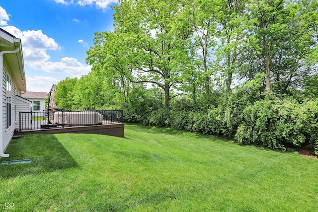 5580 Pintail Ln, Greenwood, IN 46143 - view of grassy yard with a deck