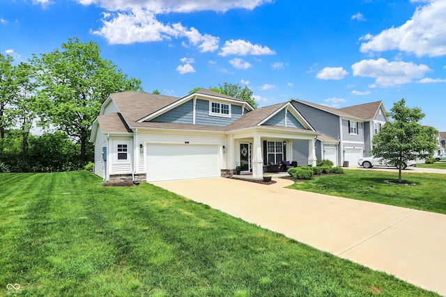5580 Pintail Ln, Greenwood, IN 46143 - view of front of property with an attached garage, a front lawn, and concrete driveway