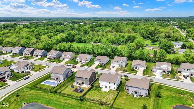 5580 Pintail Ln, Greenwood, IN 46143 - aerial view of residential area with a forest