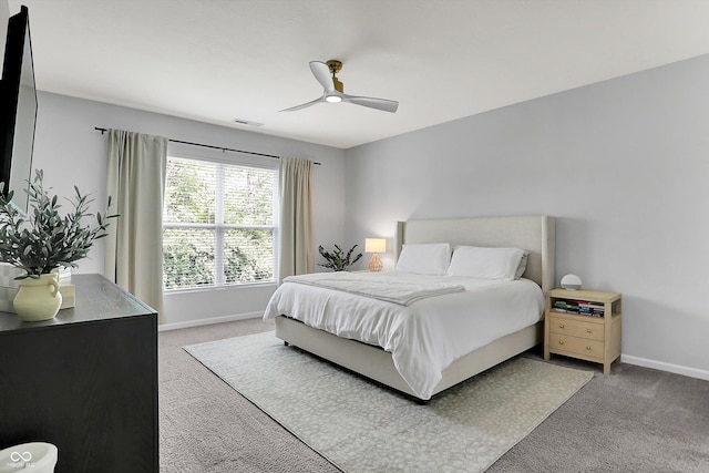 5580 Pintail Ln, Greenwood, IN 46143 - bedroom with light carpet, baseboards, and a ceiling fan