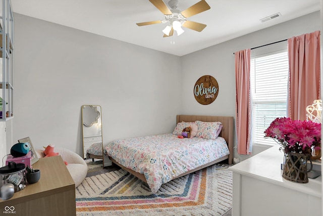 5580 Pintail Ln, Greenwood, IN 46143 - bedroom with wood finished floors and ceiling fan