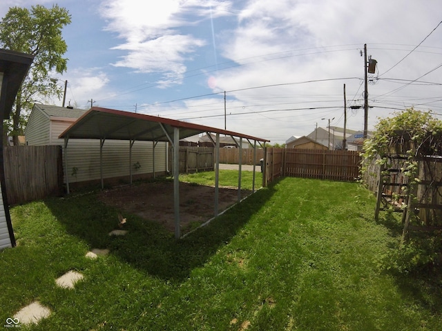 view of yard with a carport