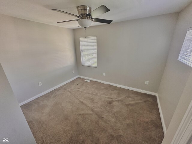 2940 N Park Ave, Indianapolis, IN 46205 - carpeted spare room featuring ceiling fan and baseboards