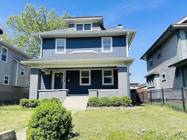 2940 N Park Ave, Indianapolis, IN 46205 - traditional style home featuring a porch, a chimney, and a shingled roof