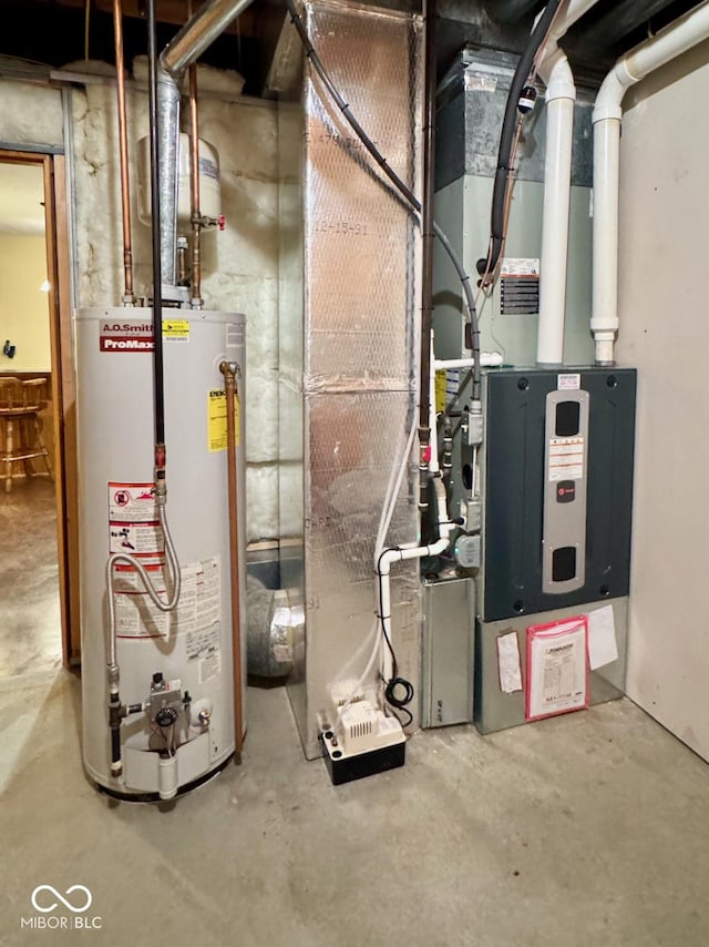 utility room featuring water heater