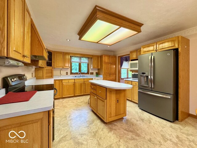 kitchen with stainless steel fridge with ice dispenser, white microwave, a sink, light countertops, and ornamental molding