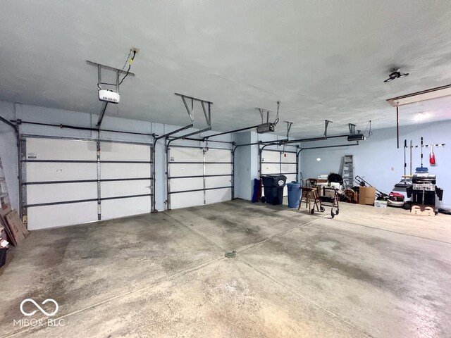 garage featuring a garage door opener