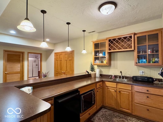 bar with black dishwasher, a sink, pendant lighting, built in microwave, and recessed lighting