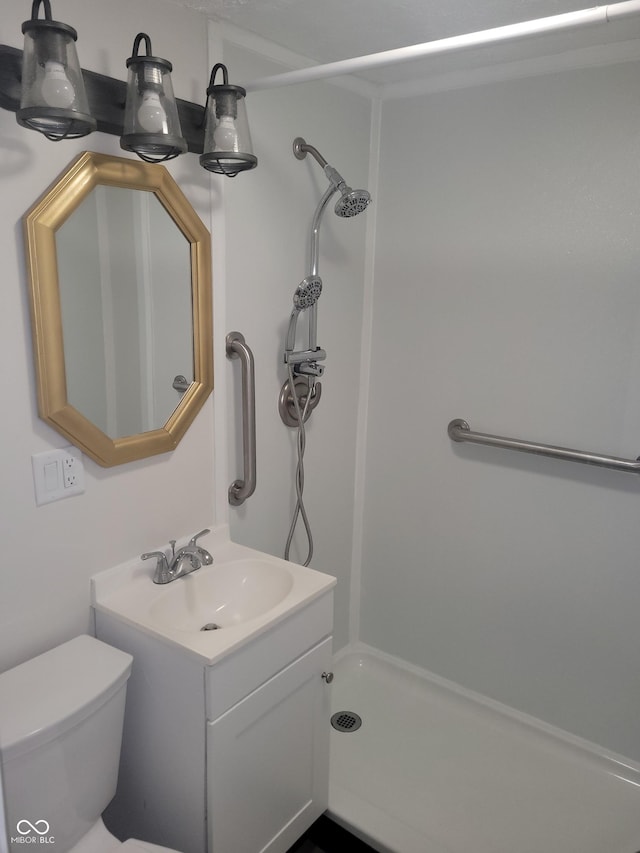 2855 Walker Ave, Indianapolis, IN 46203 - full bath featuring vanity, walk in shower, and toilet