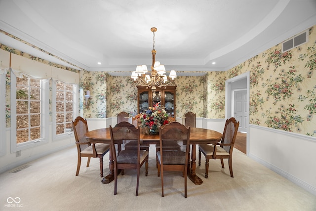 6821 Ripple Creek Dr, Lafayette, IN 47905 - dining room featuring an inviting chandelier, a tray ceiling, wallpapered walls, and visible vents