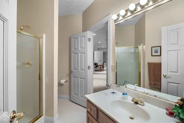 6821 Ripple Creek Dr, Lafayette, IN 47905 - full bathroom featuring vanity, baseboards, and a shower stall