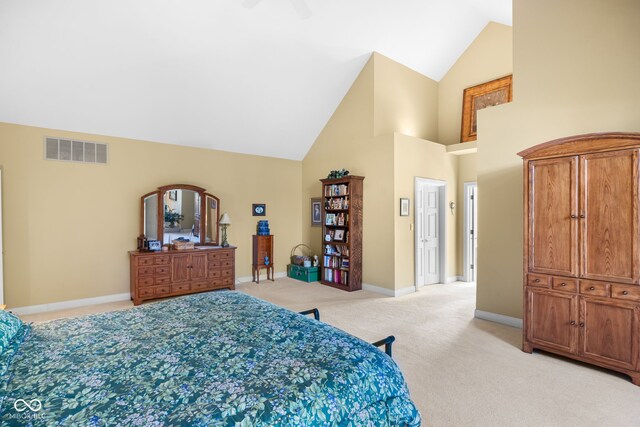 6821 Ripple Creek Dr, Lafayette, IN 47905 - bedroom featuring visible vents, baseboards, high vaulted ceiling, and light colored carpet