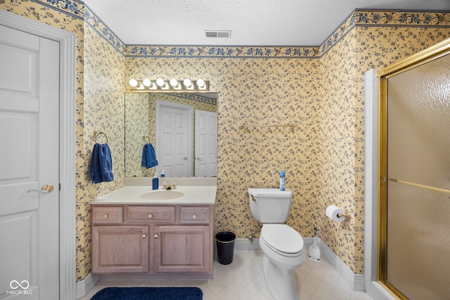 6821 Ripple Creek Dr, Lafayette, IN 47905 - full bathroom with vanity, toilet, wallpapered walls, a shower stall, and visible vents