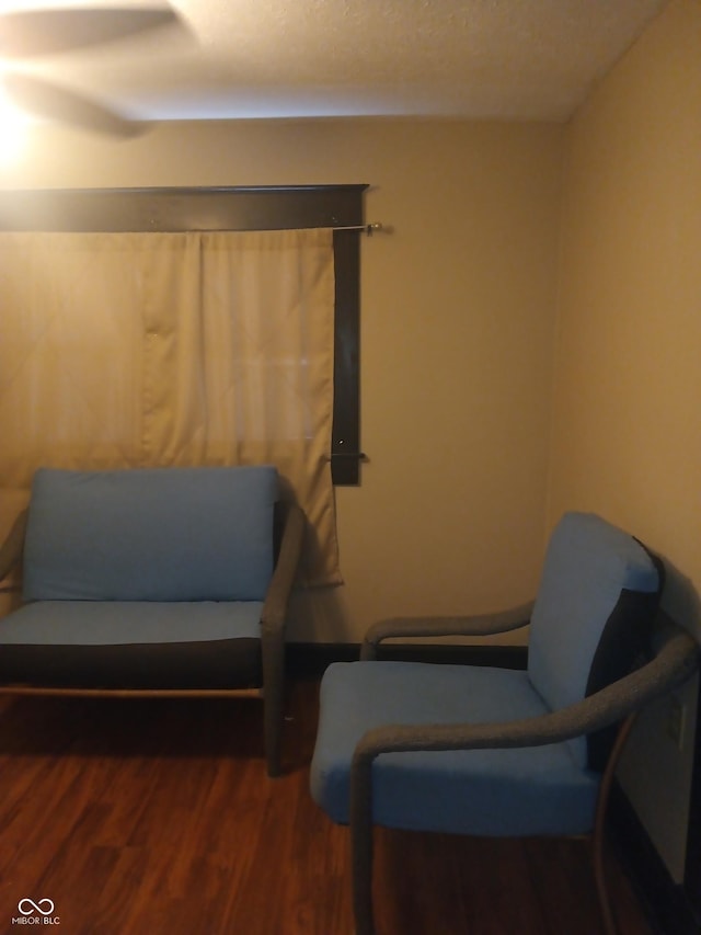 living area with wood finished floors
